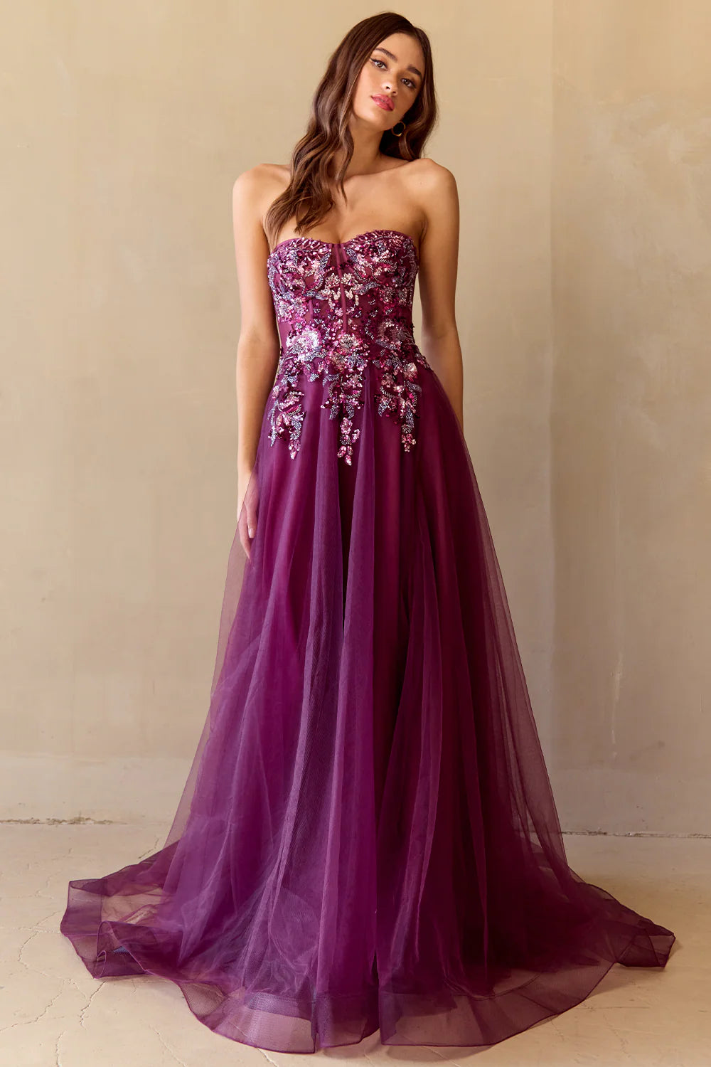 A-line sleeveless strapless and floor length skirt with sequin decals