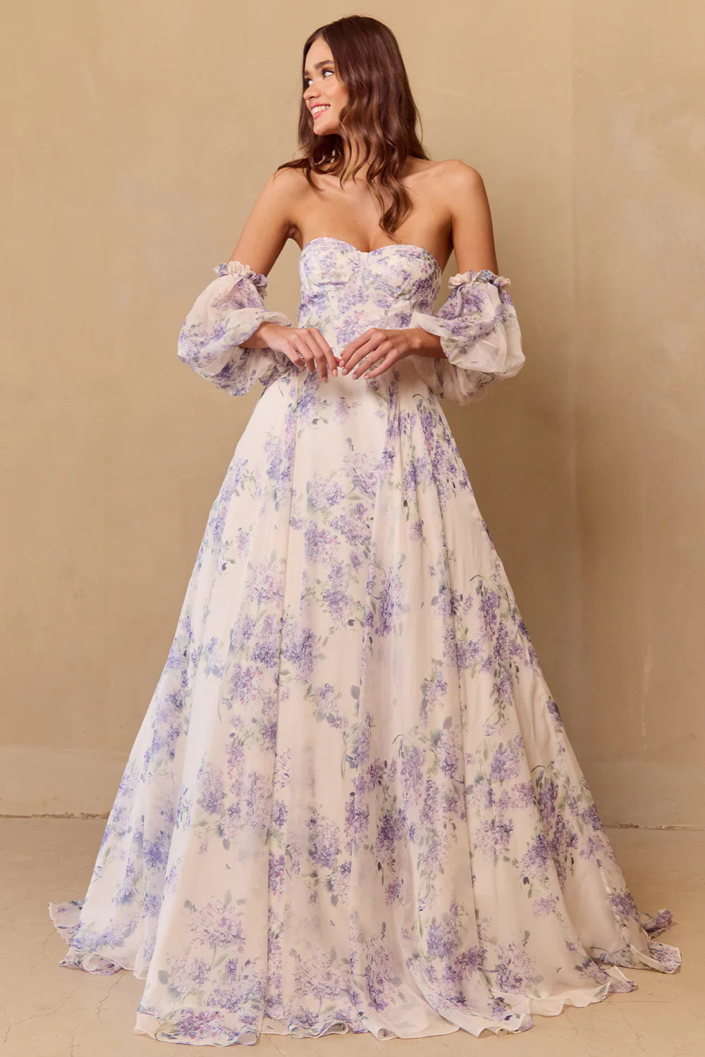 A-line sleeveless strapless floral skirt with bubble sleeves that are detachable