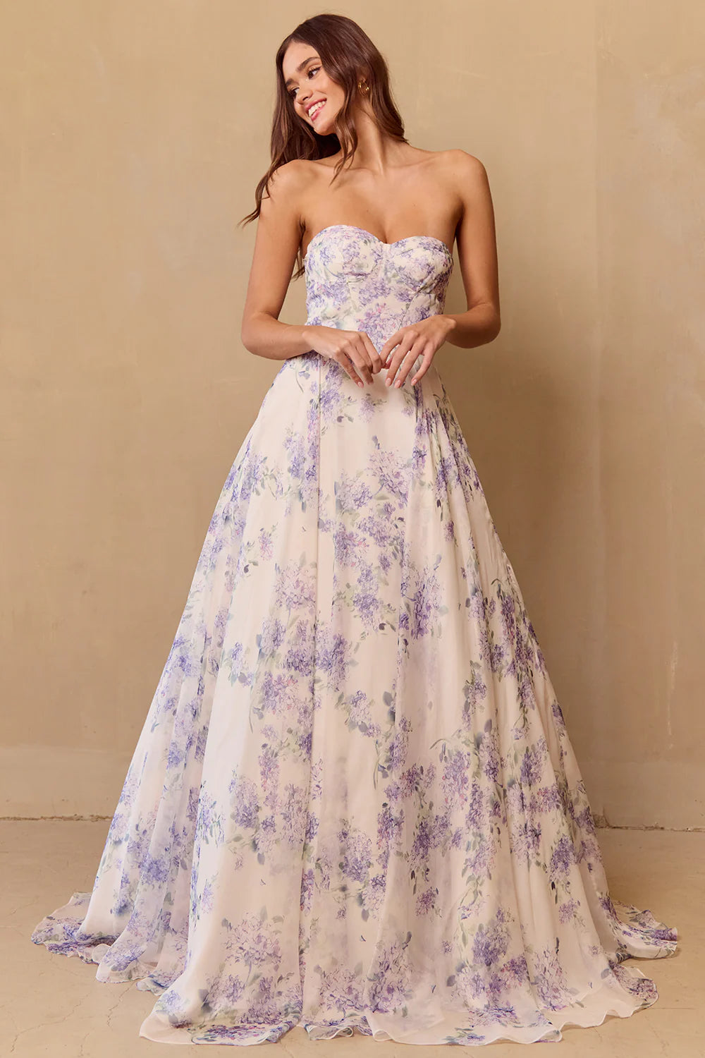 A-line sleeveless strapless floral skirt with bubble sleeves that are detachable