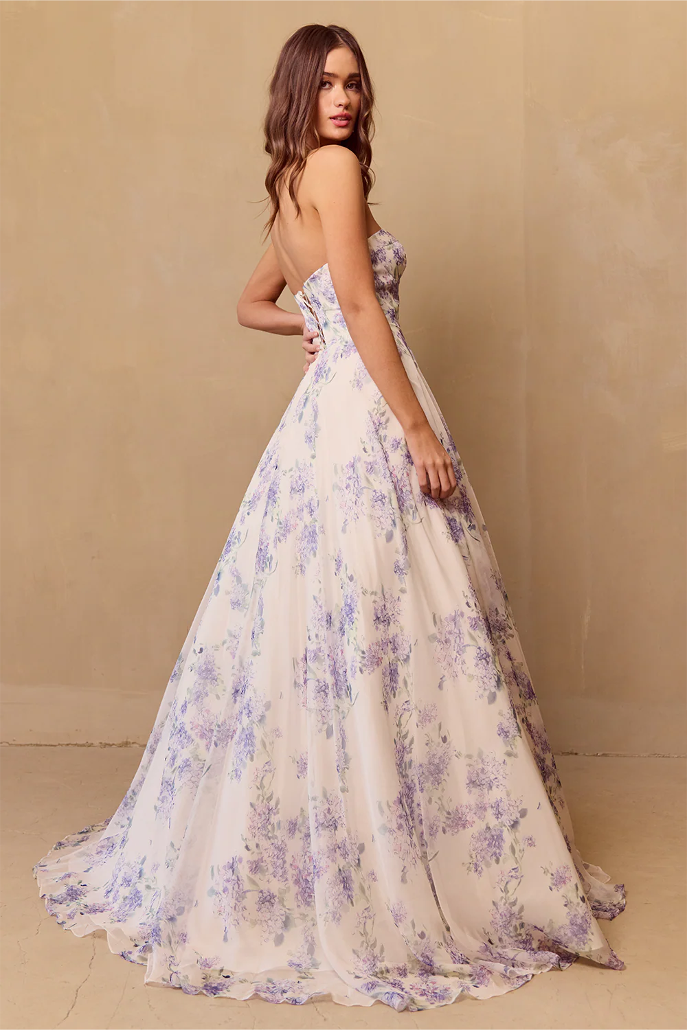 A-line sleeveless strapless floral skirt with bubble sleeves that are detachable