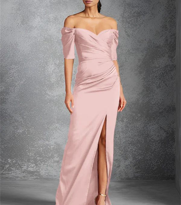 Tight off shoulder short sleeved floor standing bridal dress with front slit