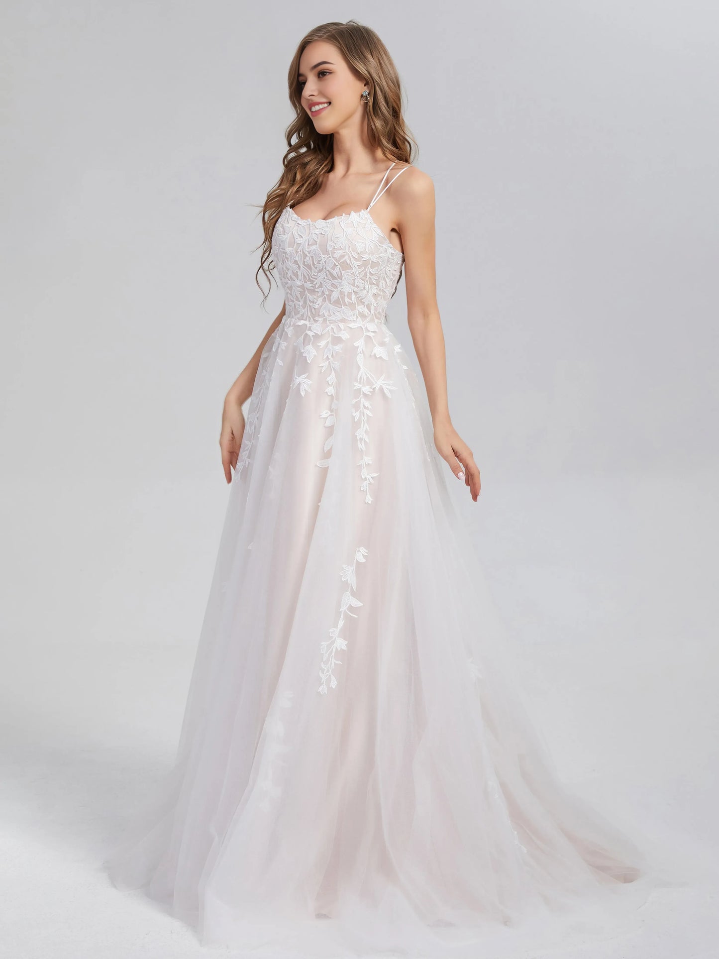 White Criss Cross Appliques Satin Tulle Prom Dress with Spaghetti Straps Floral Lace Appliqués and A - Line Silhouette