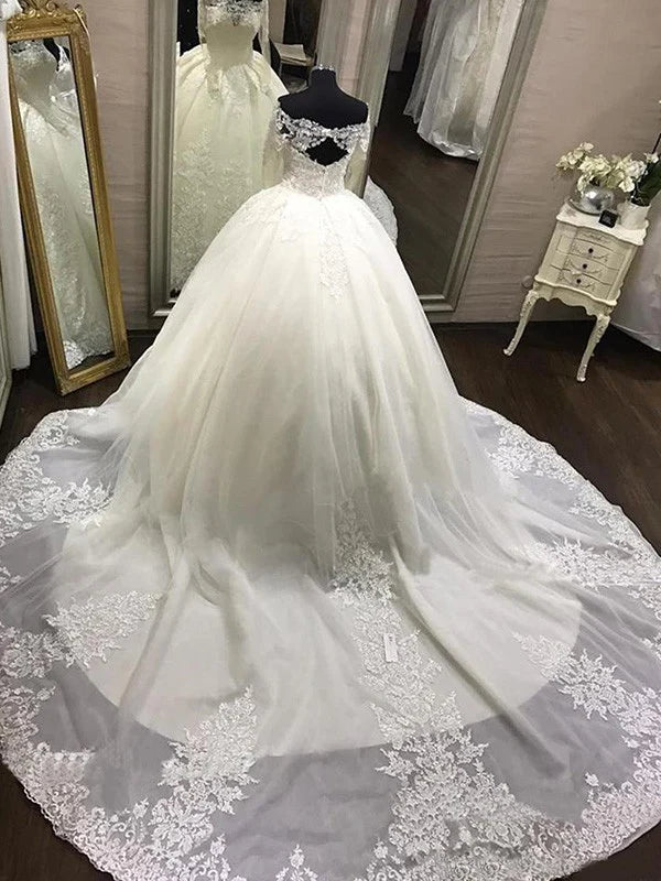 Off shoulder long sleeved backless lace wedding dress