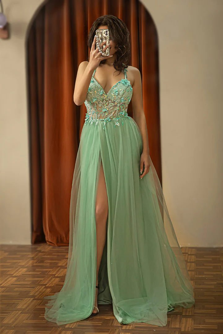 Deep V-strap backless beaded split ball gown