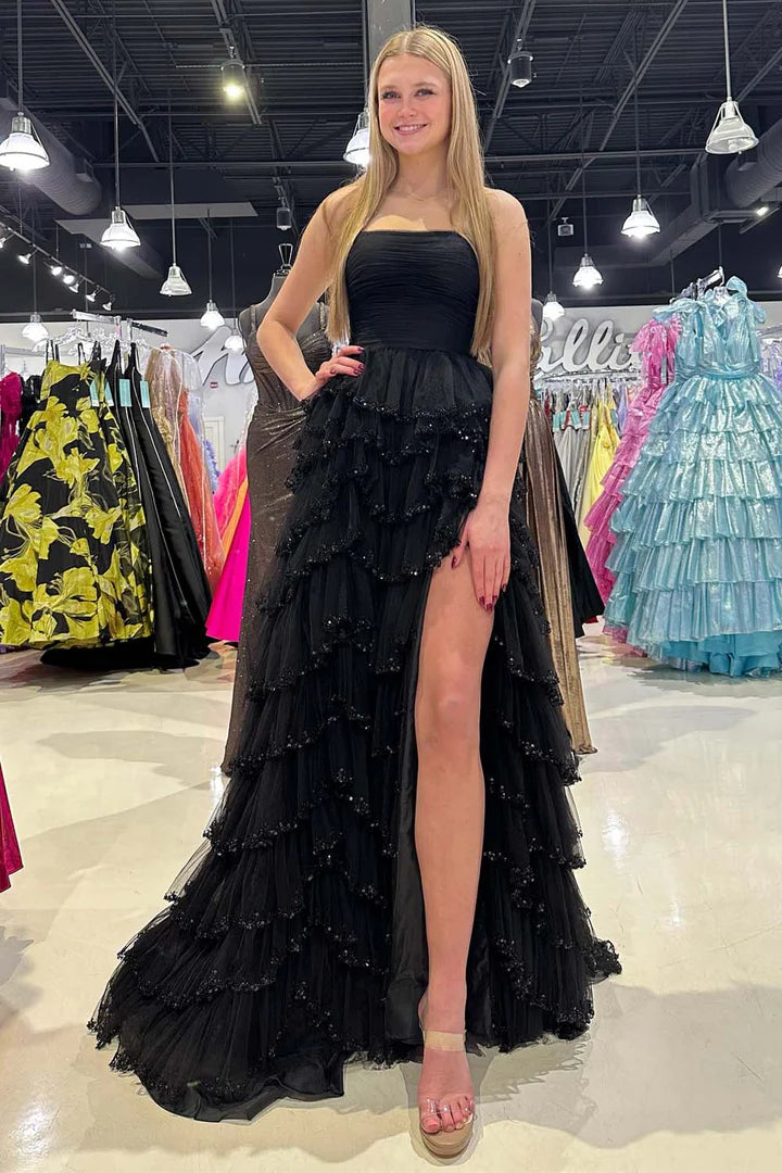 Strapless sleeveless pleated hem waist cinching side slit ballroom dress