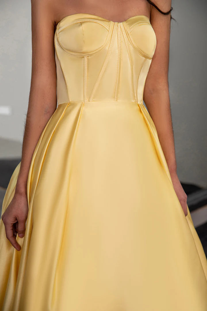 Yellow sleeveless strapless fishbone corset ball gown