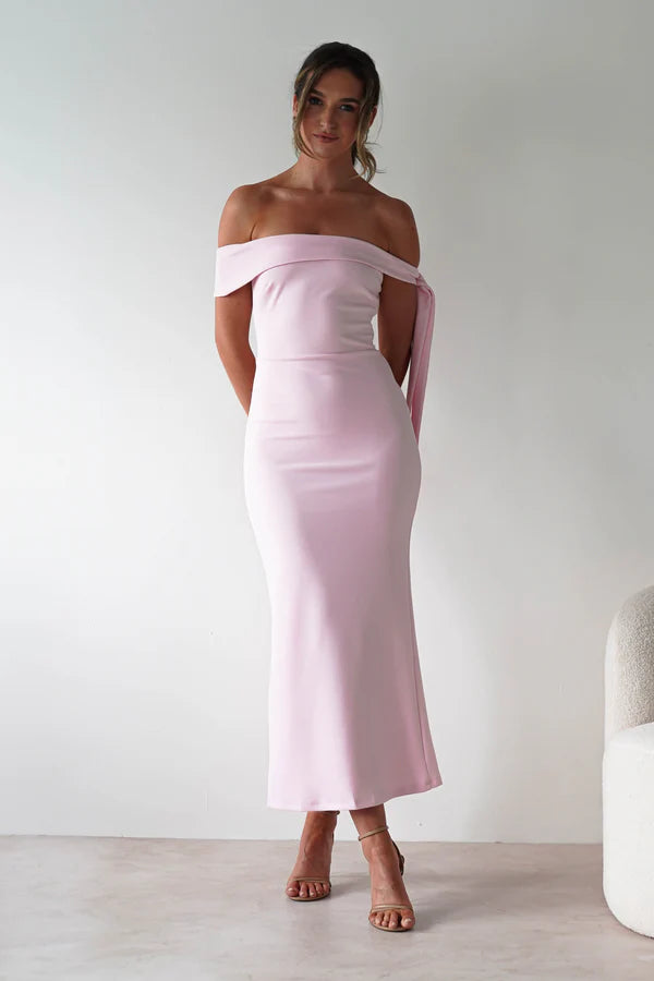 Sleeveless tight fitting waist cinching dress