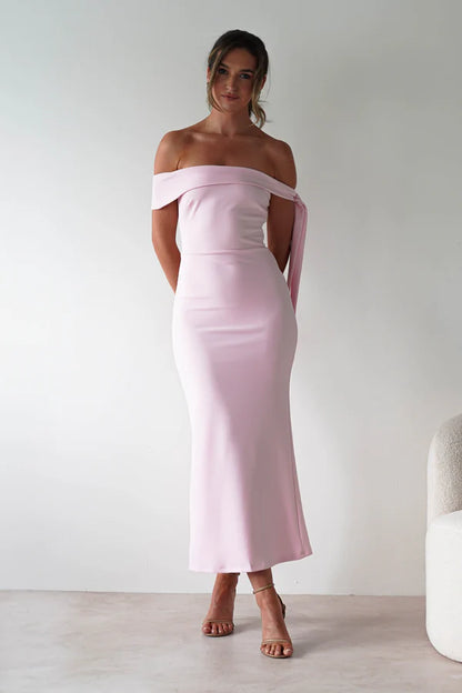 Sleeveless tight fitting waist cinching dress