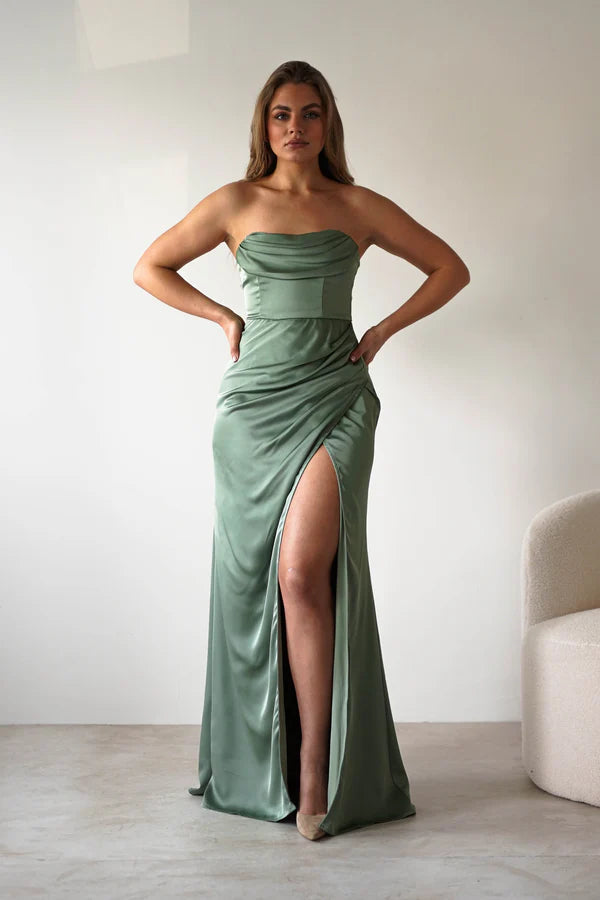 Strapless sleeveless waist cinching dress with side slit