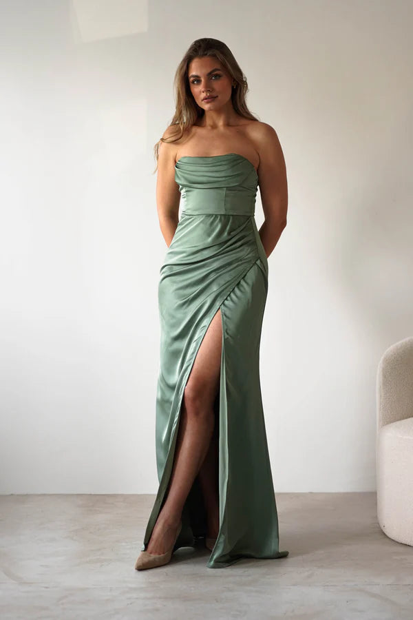 Strapless sleeveless waist cinching dress with side slit