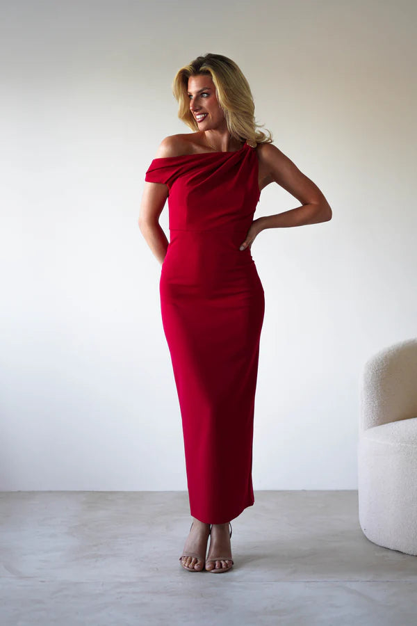 Red single room with waist cinching dress with a slit at the back