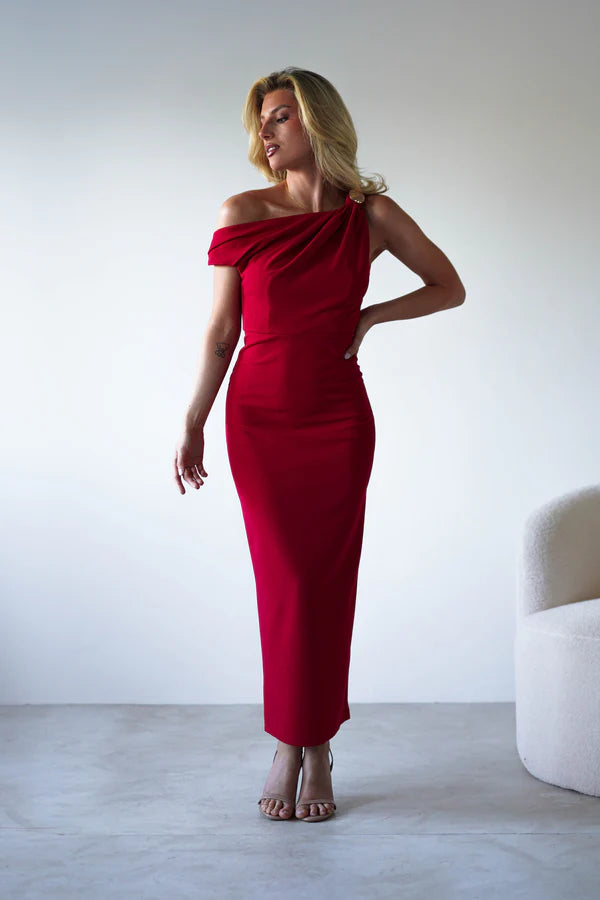 Red single room with waist cinching dress with a slit at the back