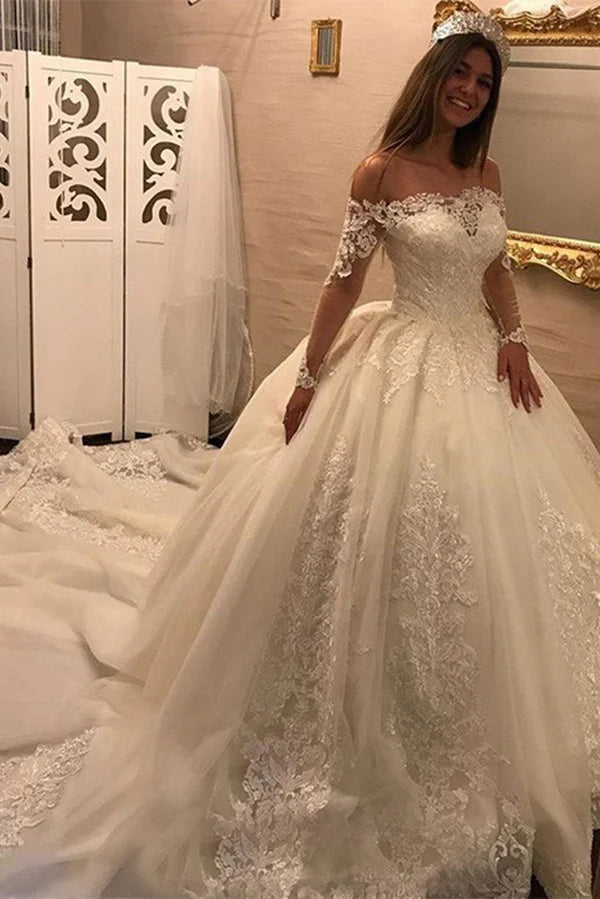 Off shoulder long sleeved backless lace wedding dress