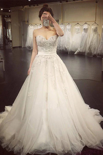 White A-line sweetheart sleeveless strapless beaded wedding dress