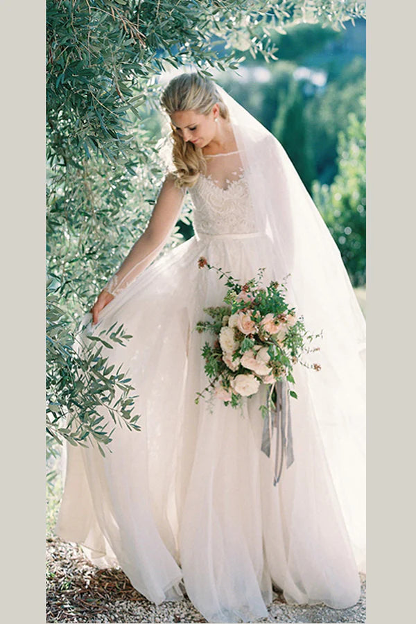 A-line long sleeved embroidered chiffon beach wedding dress