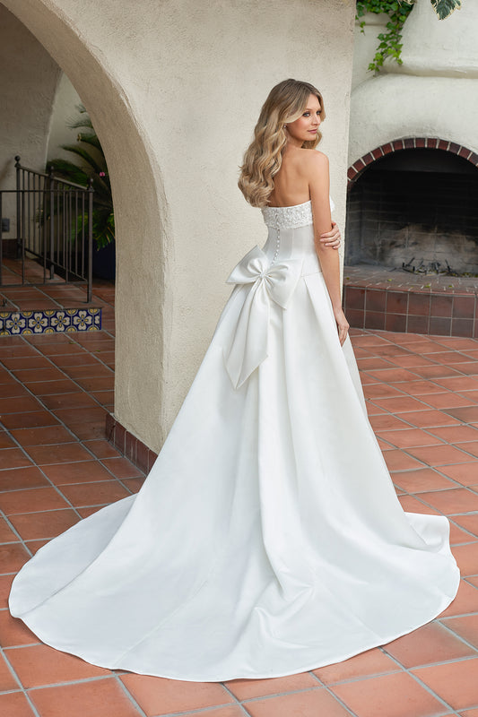 Sleeveless strapless waist cinching floor length skirt