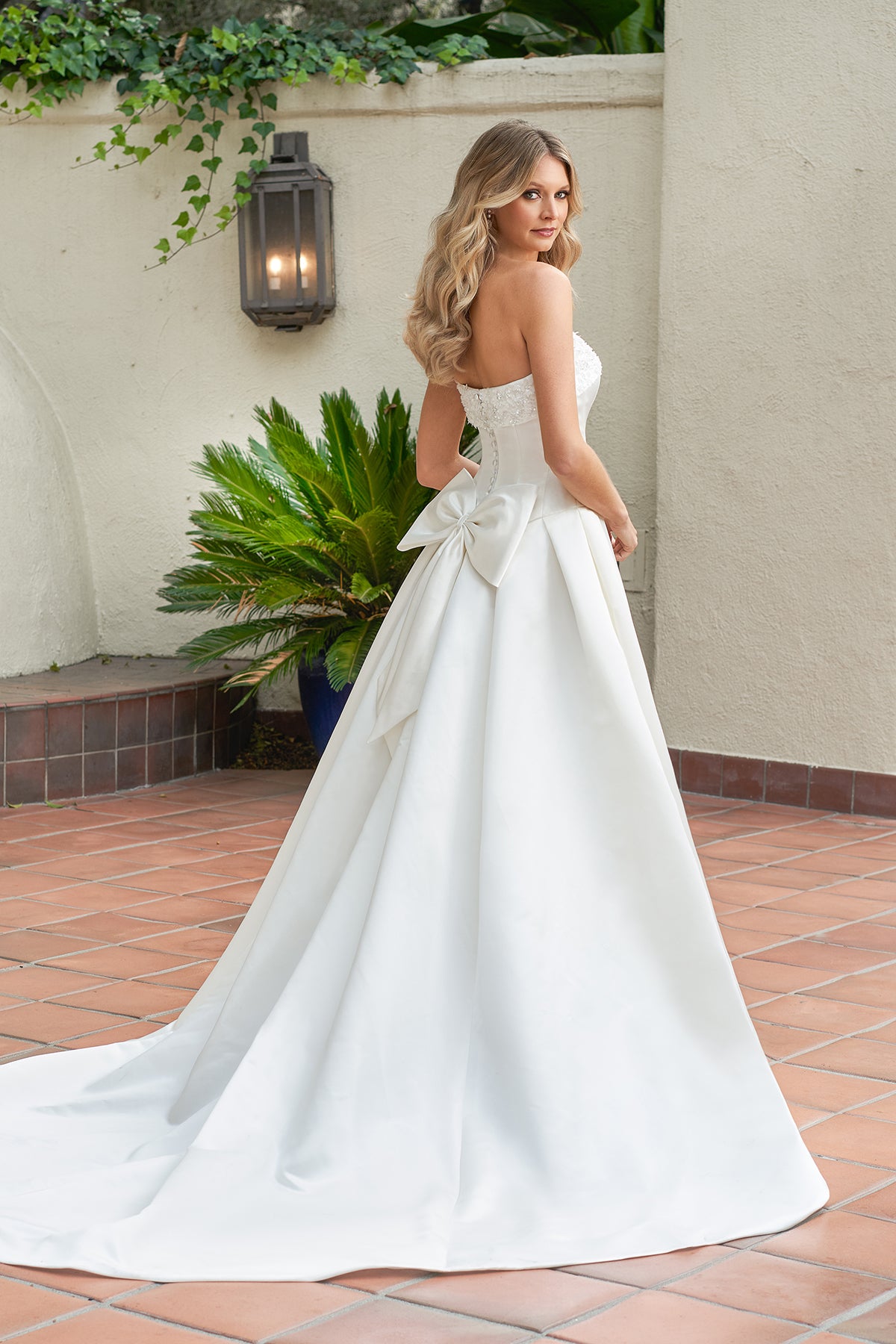 Sleeveless strapless waist cinching floor length skirt