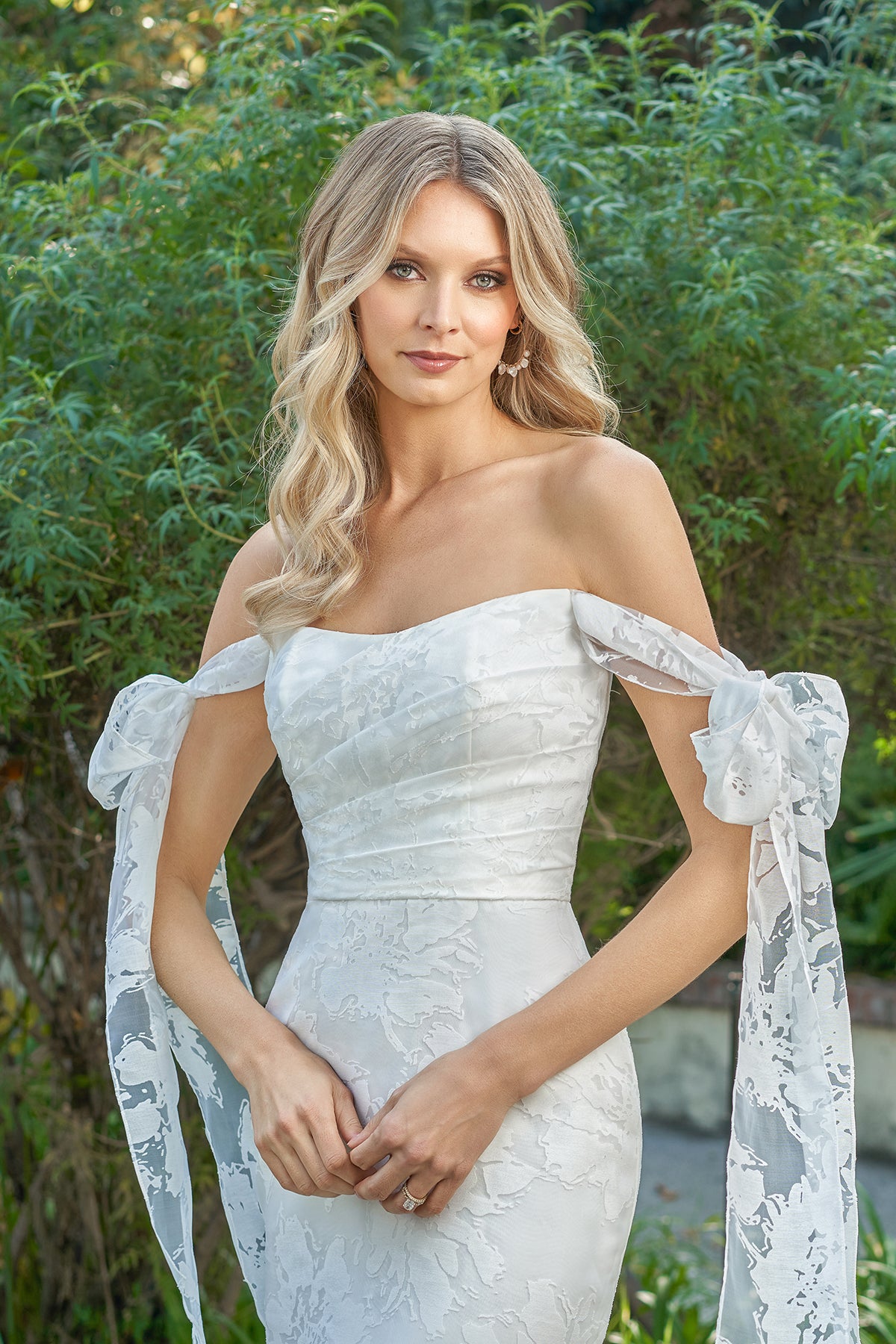 Strapless waist cinching lace bow and floor length skirt