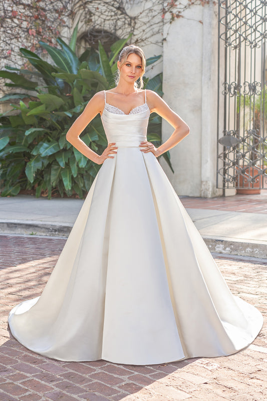 Thin shoulder strap with exposed back and floor length skirt with diamond stickers
