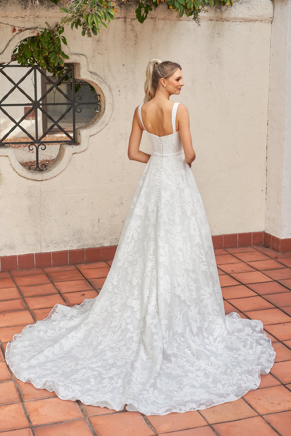 Wide shoulder strap waist cinching lace and floor length skirt