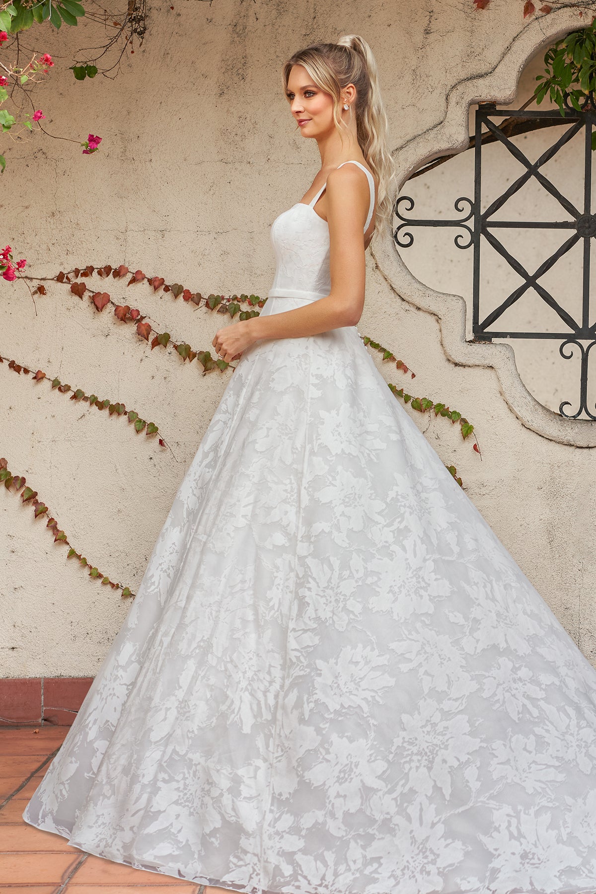 Wide shoulder strap waist cinching lace and floor length skirt