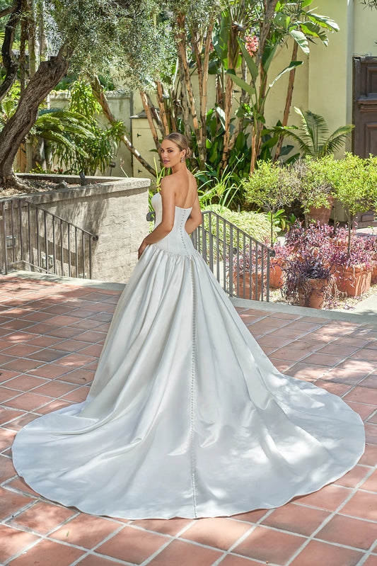 Sleeveless strapless tight corset and floor length skirt