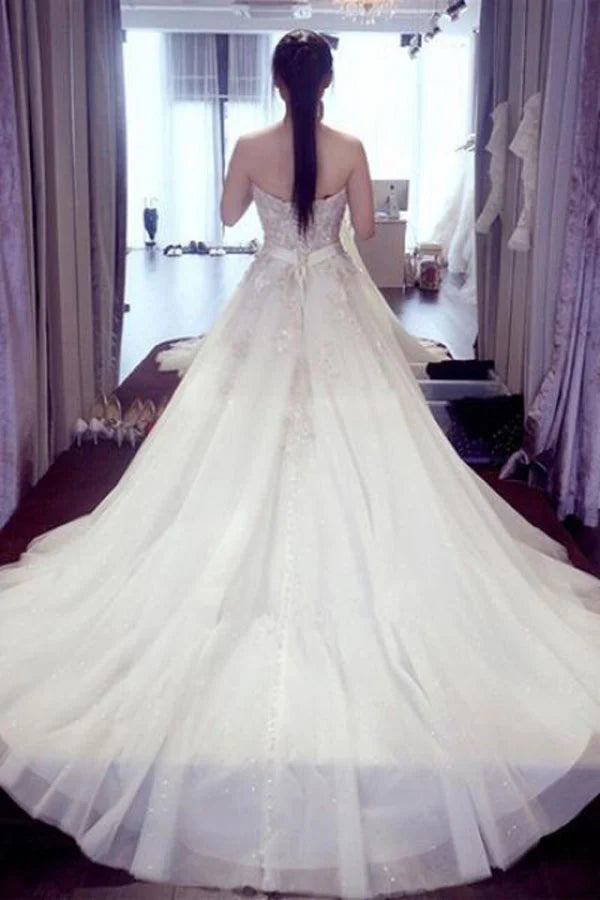 White A-line sweetheart sleeveless strapless beaded wedding dress