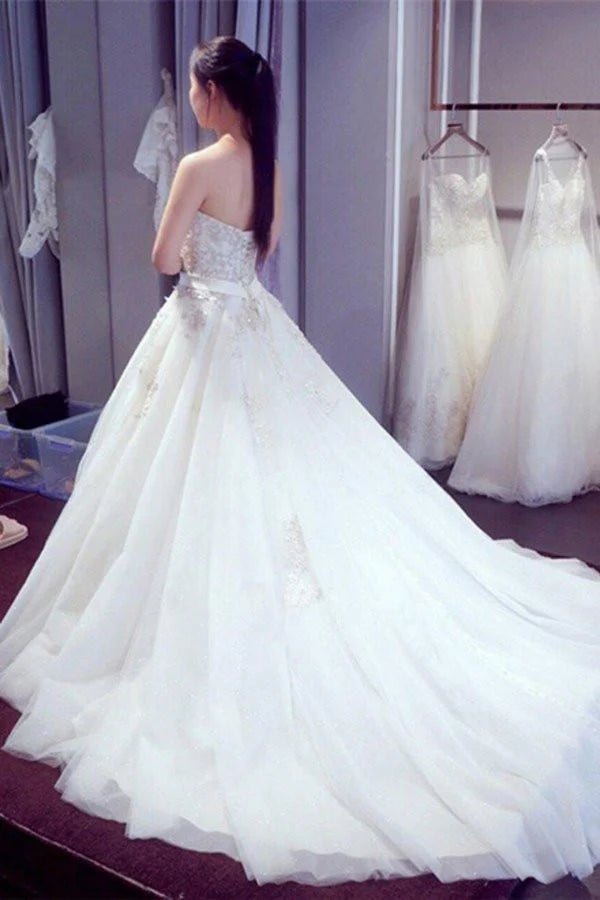 White A-line sweetheart sleeveless strapless beaded wedding dress