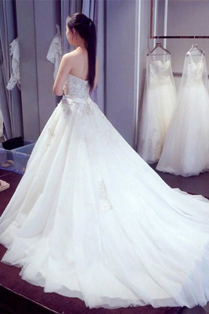 White A-line sweetheart sleeveless strapless beaded wedding dress