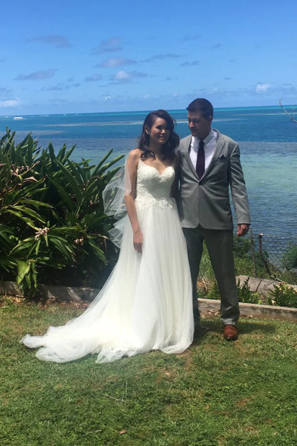 A-line sleeveless chiffon applique beach wedding dress