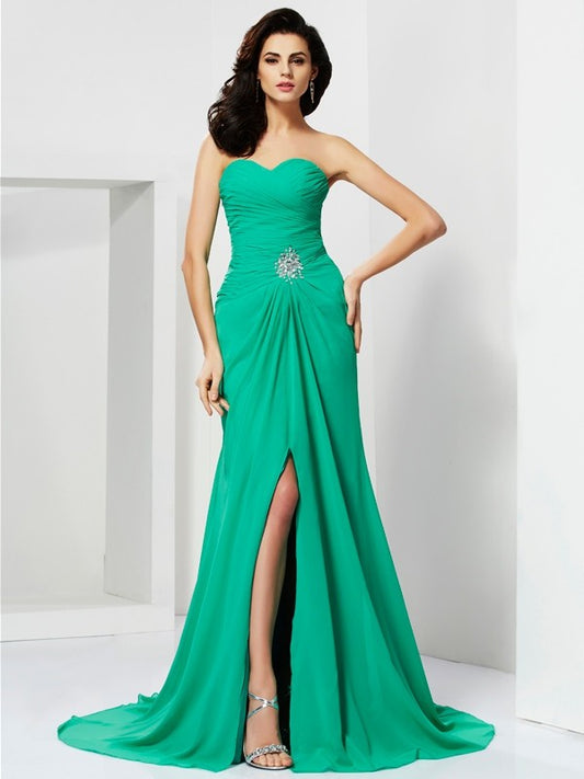 Sleeveless strapless waist cinched mermaid dress with rhinestones