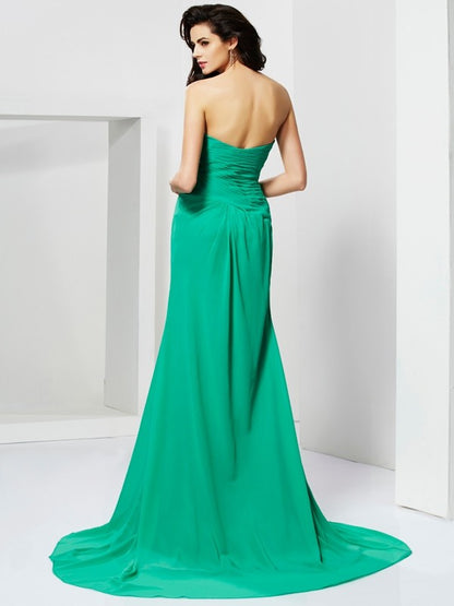 Sleeveless strapless waist cinched mermaid dress with rhinestones