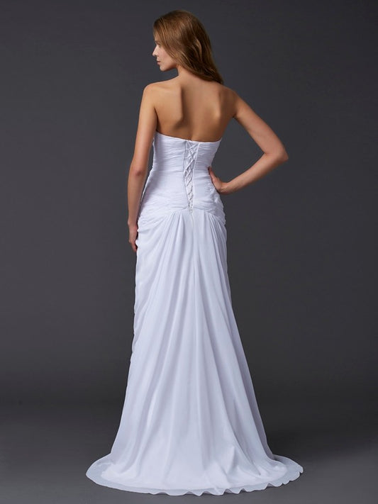 Sleeveless strapless waist cinched mermaid side slit