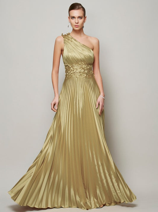 A-line one shoulder sleeveless floor length dress paired with handmade floral dress