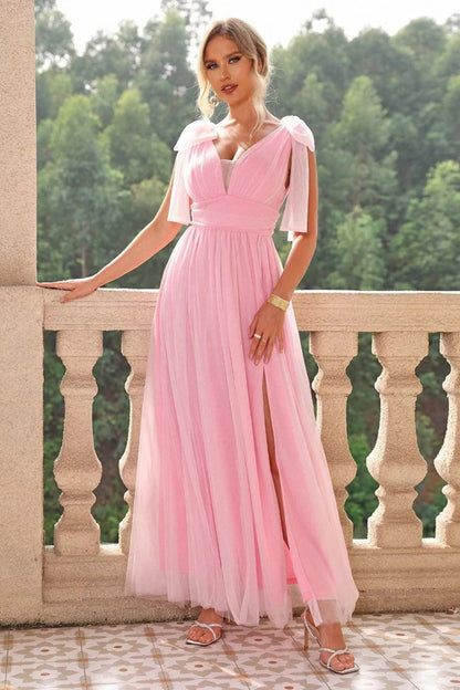 A-line powder blusher pink pleated wedding guest dress with side slit