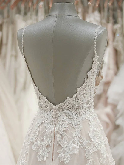 Thin strap V-neck sleeveless backless lace applique wedding dress