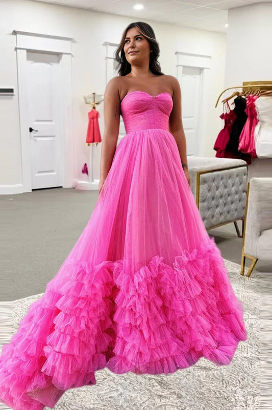 Hot pink strapless strapless ball gown with ruffled edges