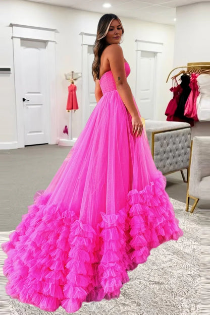Hot pink strapless strapless ball gown with ruffled edges