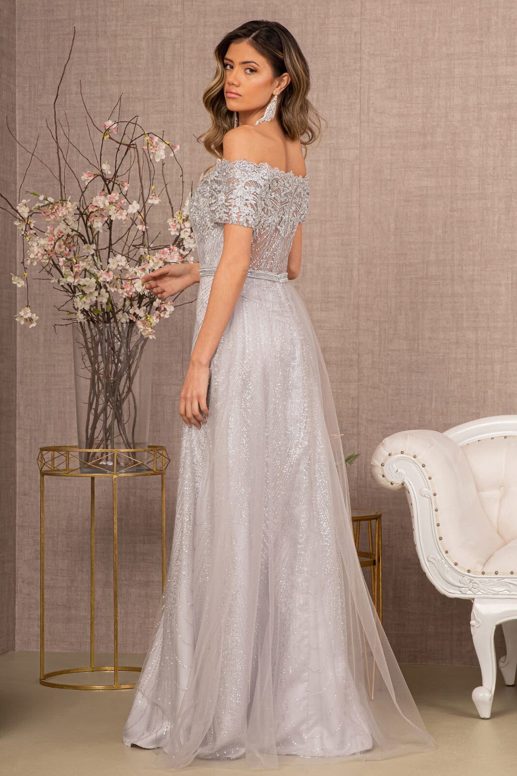 A-line off shoulder short sleeved dress with full diamond and sheer tail