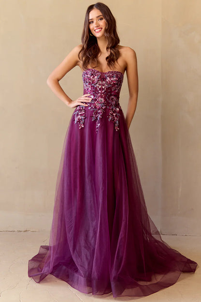 A-line sleeveless strapless and floor length skirt with sequin decals