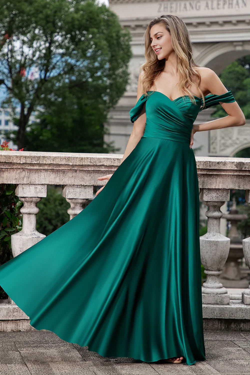 A charming A-line off shoulder pleated satin long bridesmaid dress with full charm