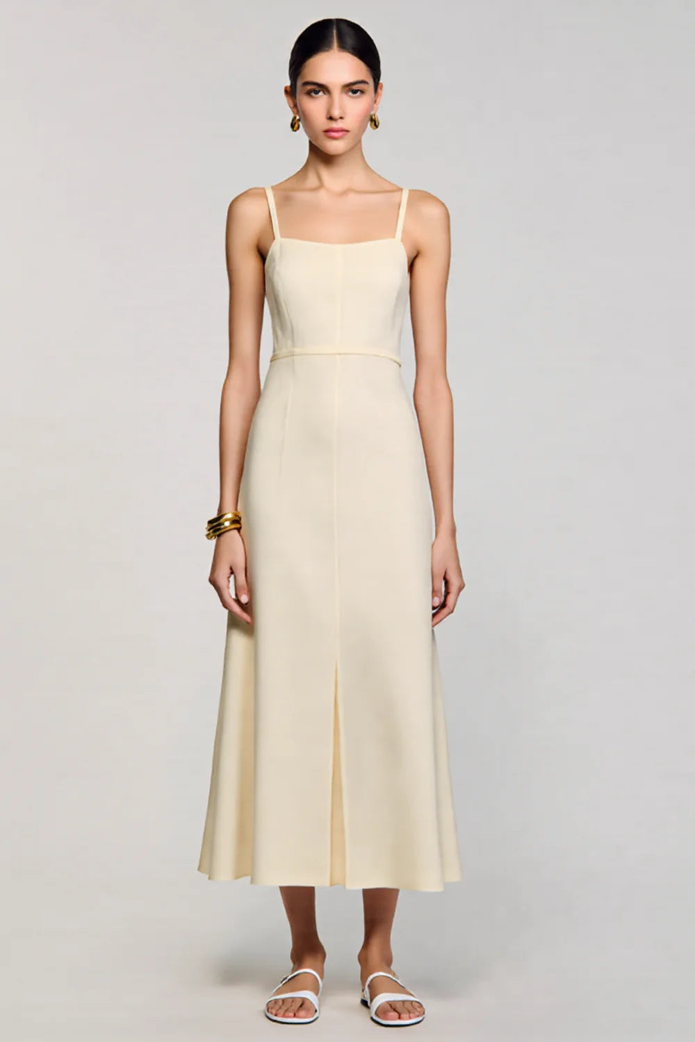Apricot colored simple A-line spaghetti strap wedding guest dress