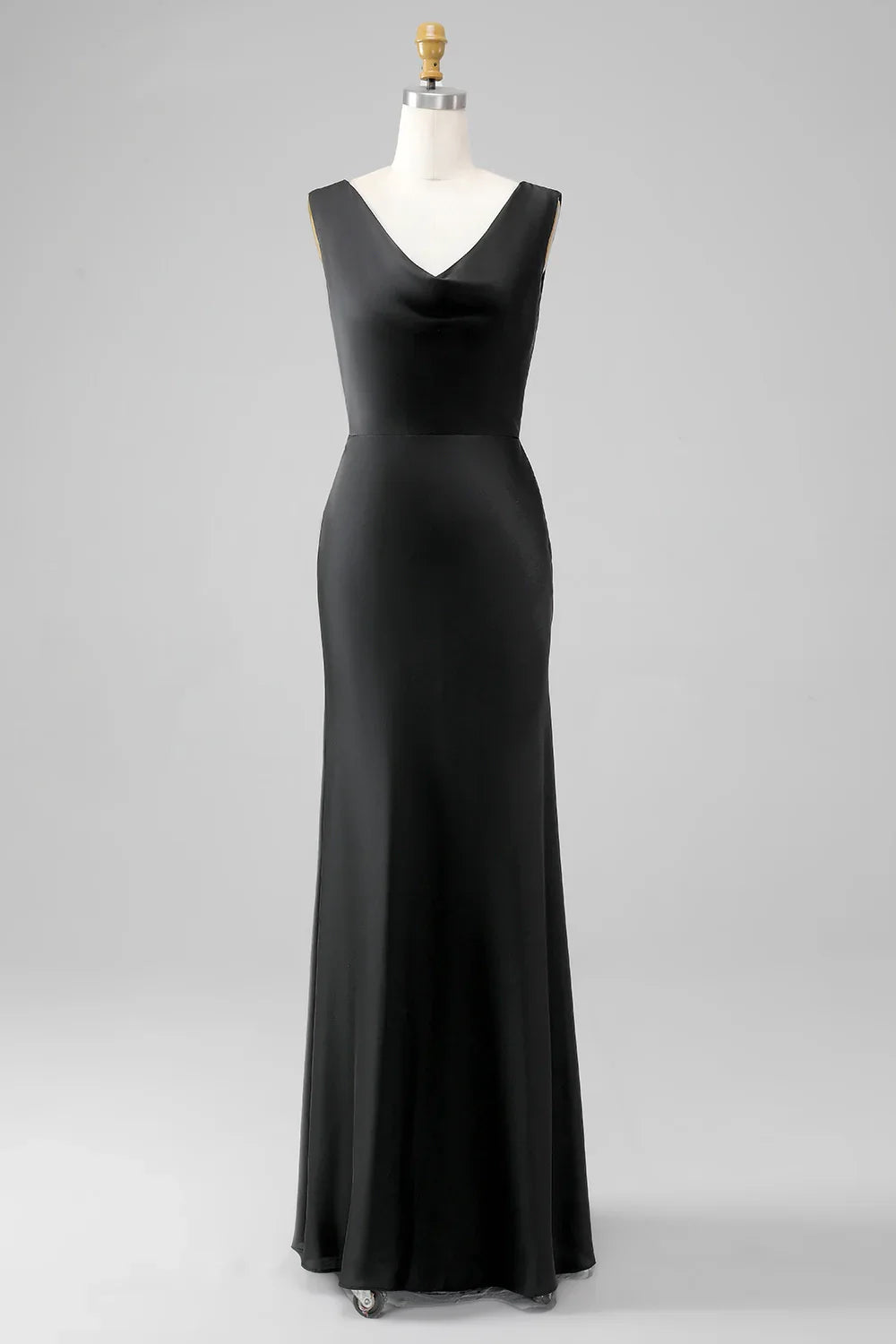 A tight fitting V-neck sleeveless and satin bridesmaid dress with full charm