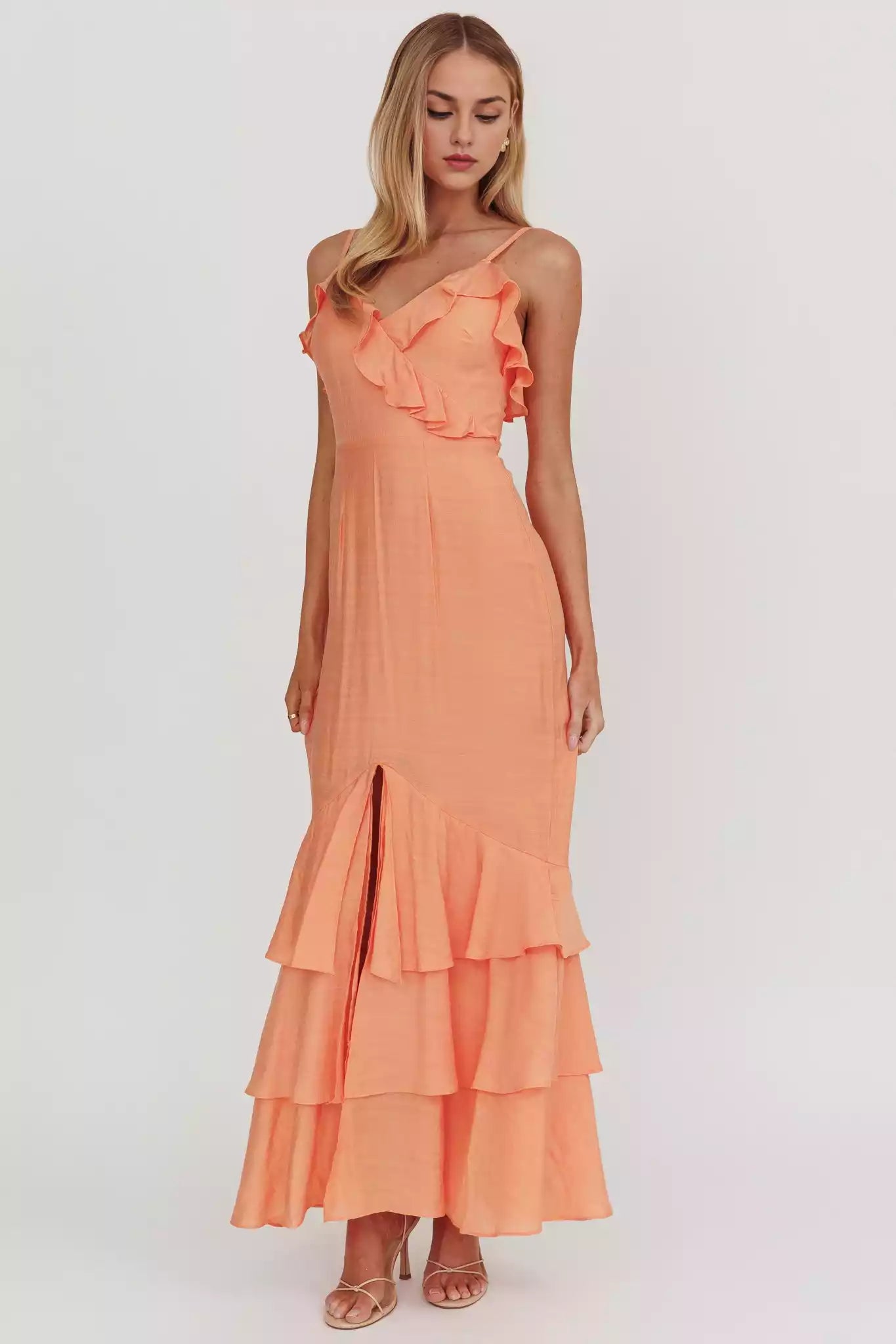 Beautiful adjustable camisole lining with ruffle details, front slit and back with zipper Prom Dresses