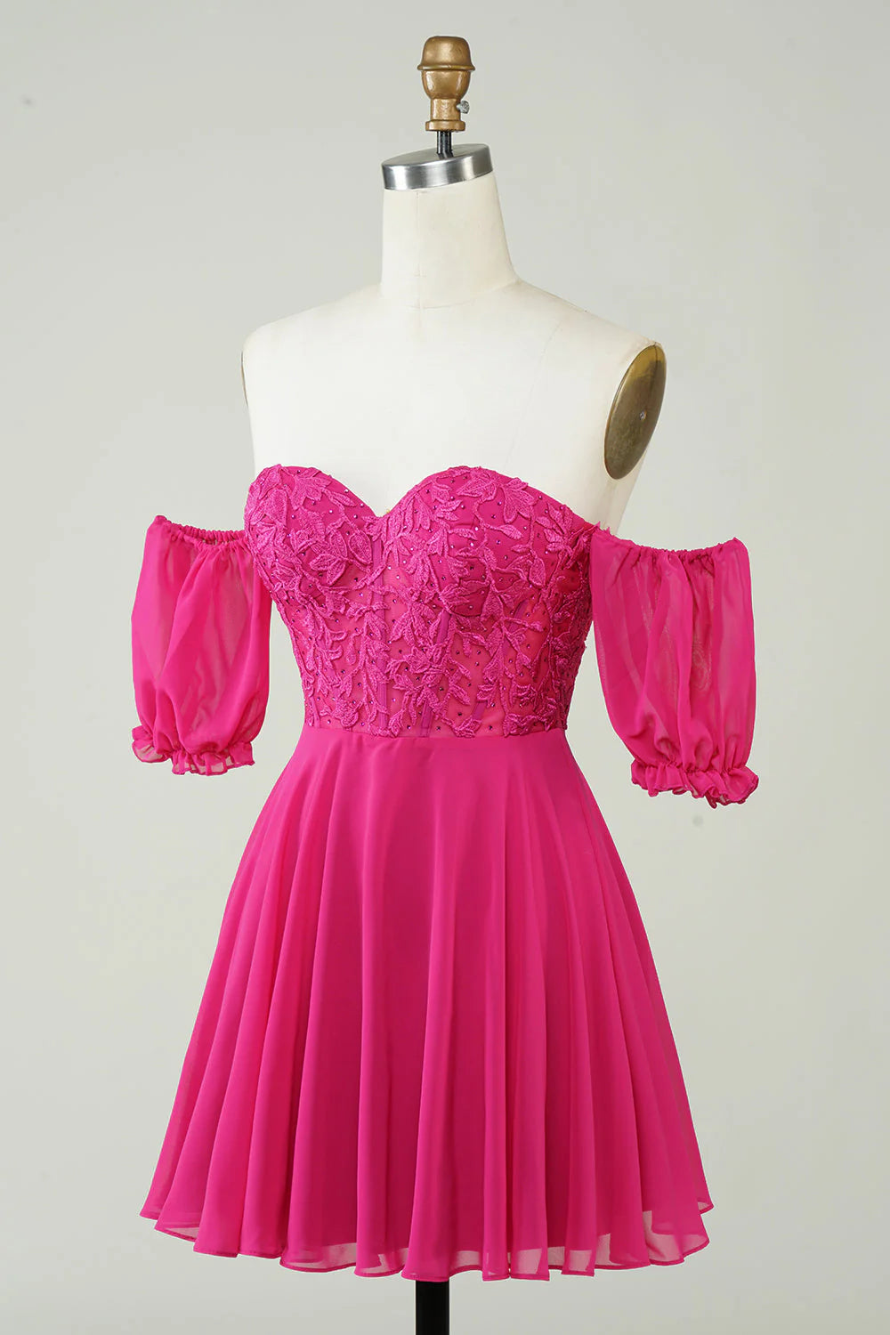 Side view of the fuchsia A-line short homecoming dress, highlighting the chiffon skirt.