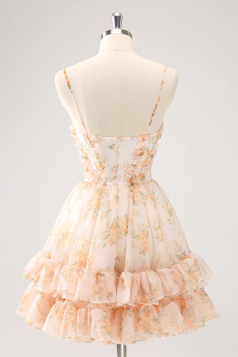 Back view of yellow strapless A-line floral dress with cut-out detail.