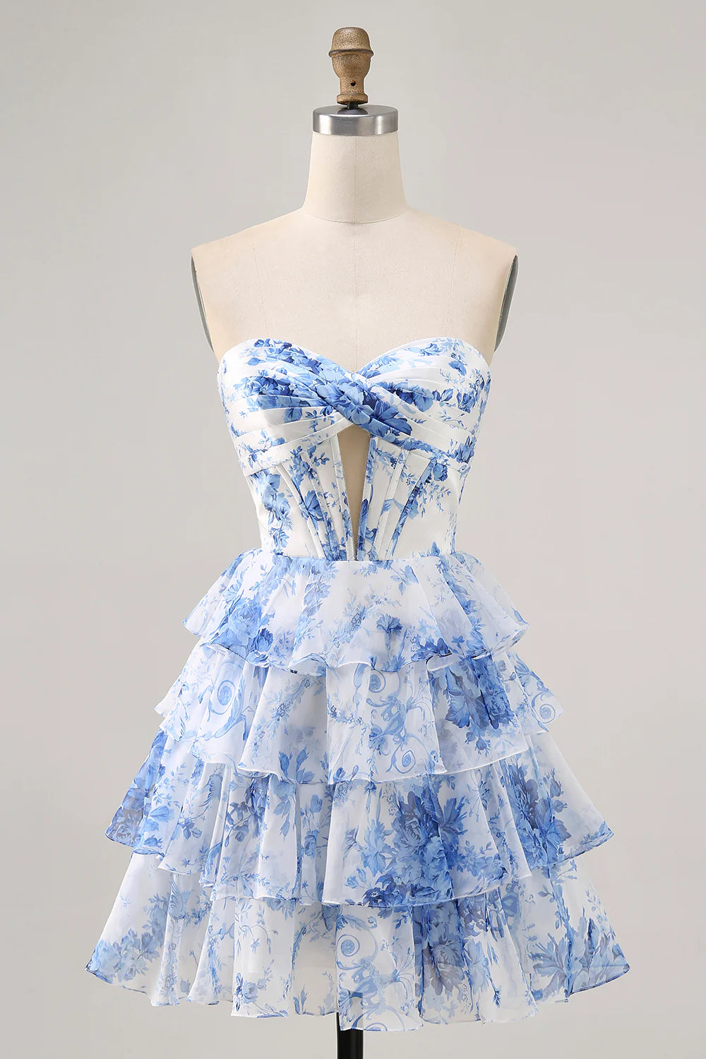 White and blue floral A-line strapless tiered short homecoming dress with corset detail.