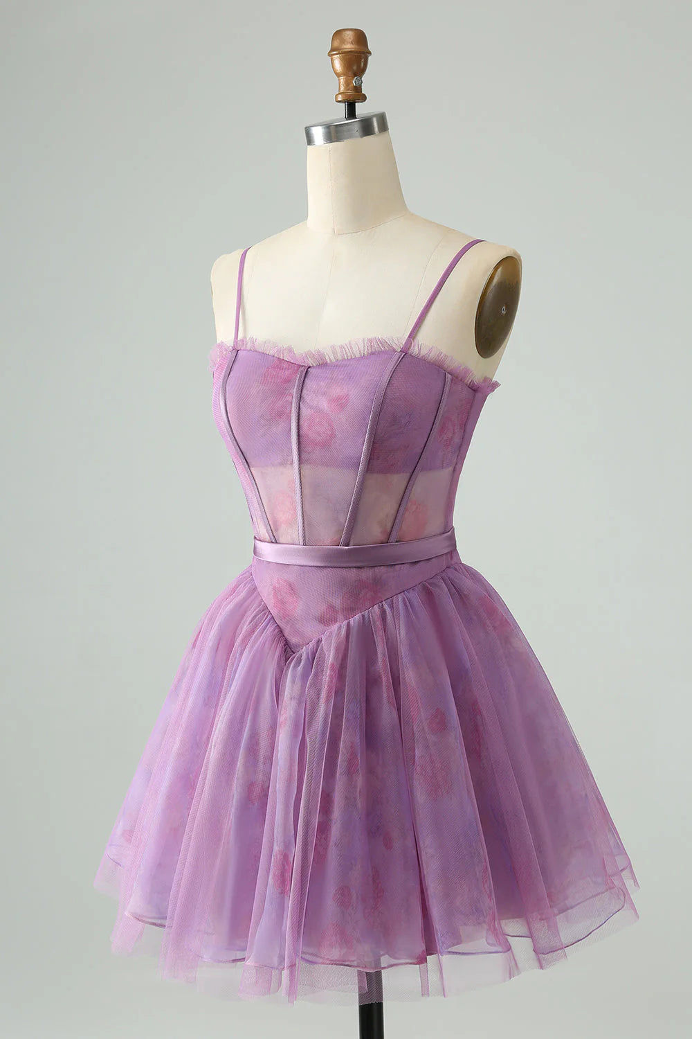 Side view of the purple A-line spaghetti strap dress, highlighting the short length.