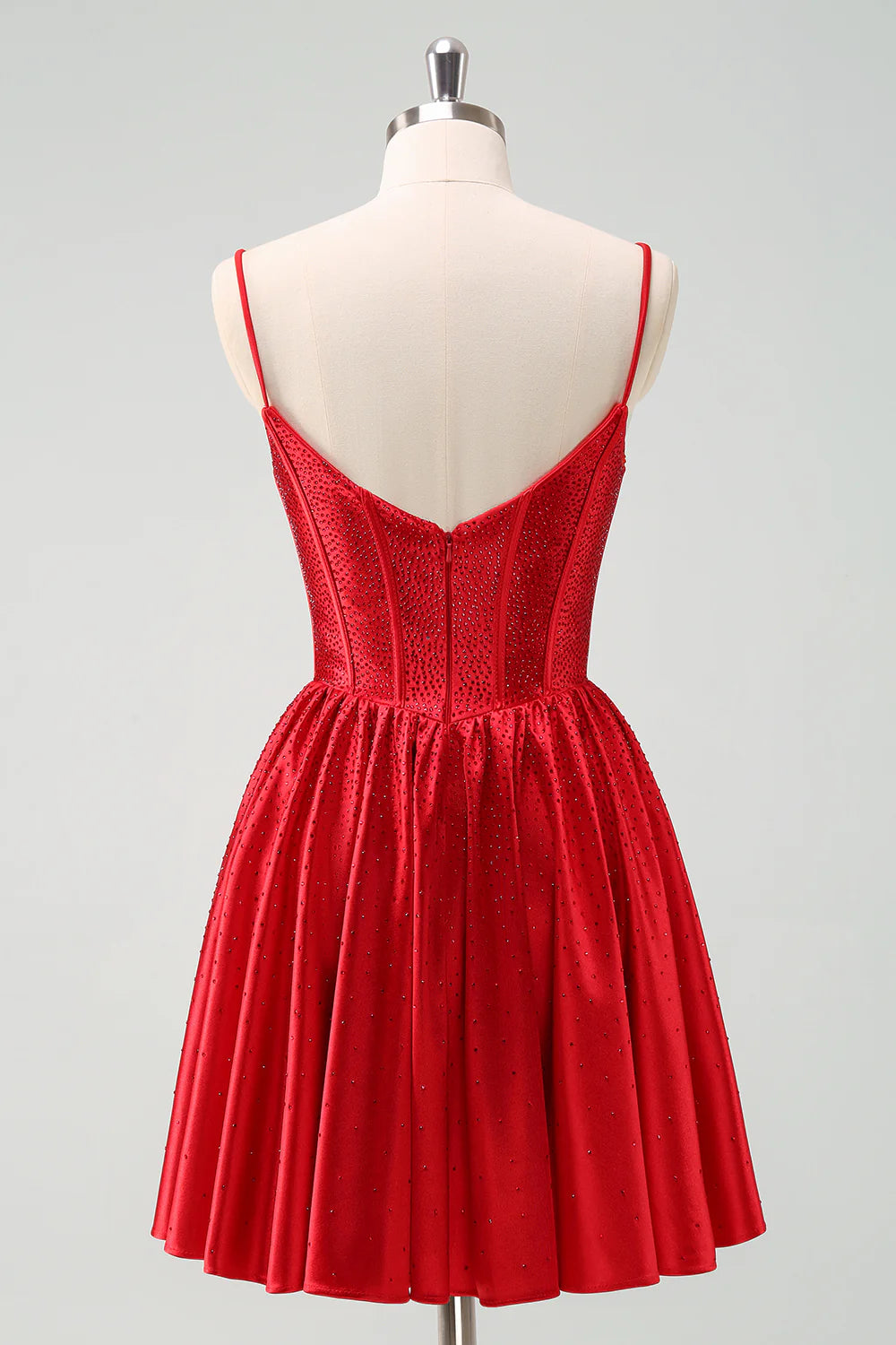 Side view of the red A-line homecoming dress, showcasing ruffle and beaded details.