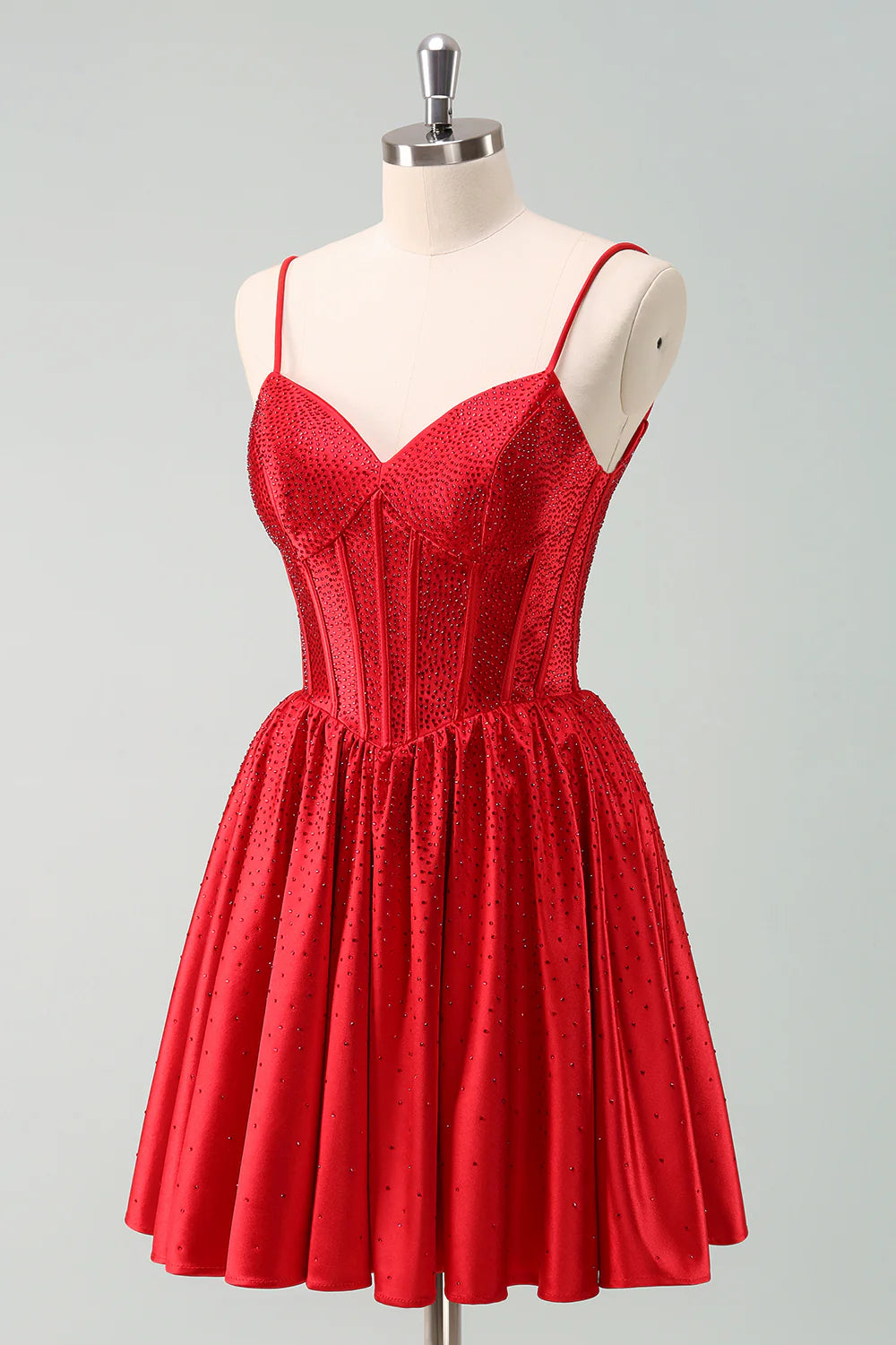 Back view of the red A-line short dress, highlighting the corset and beading.